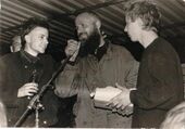 Paul and Flake handing Uwe Hager the collected money for him and the festival.